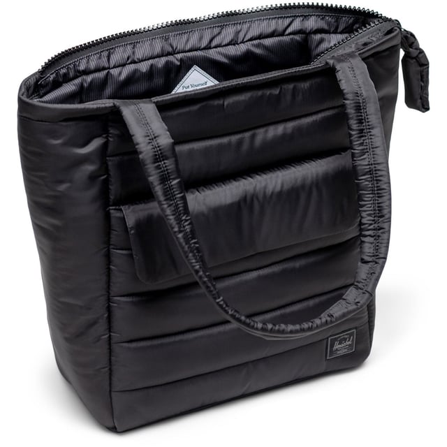 Like carrying a cloud. Made with 100% recycled quilted fabric, this versatile zip-top tote cushions your every move. Carry essentials and organize the small things in a front pocket and internal storage in this style that's just as comfy as it looks.