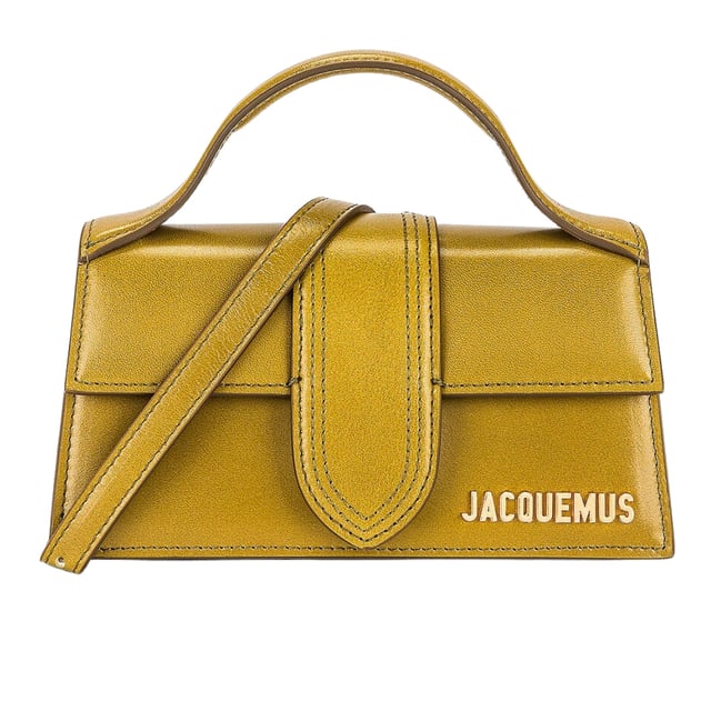 Elevate your accessory collection with the Jacquemus Le Bambino Light Khaki Green Bag. This exquisite designer piece combines understated elegance with contemporary style, featuring the signature Jacquemus minimalist aesthetic in a versatile khaki green shade. Perfect for day-to-night transitions, this compact yet statement-making bag offers both fashion-forward appeal and practical functionality. A must-have addition for the modern woman who appreciates luxury craftsmanship and distinctive design. 17.5 x 9.5 x 5.5 cm. 100% Leather Made In Italy