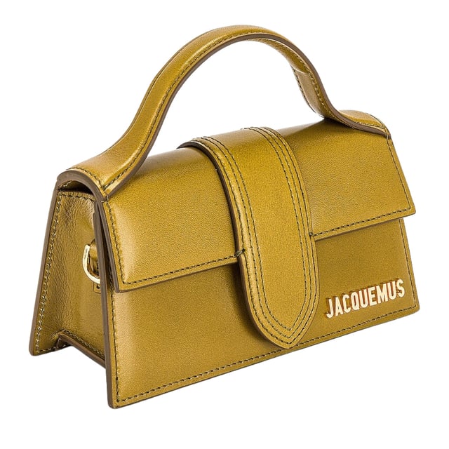 Elevate your accessory collection with the Jacquemus Le Bambino Light Khaki Green Bag. This exquisite designer piece combines understated elegance with contemporary style, featuring the signature Jacquemus minimalist aesthetic in a versatile khaki green shade. Perfect for day-to-night transitions, this compact yet statement-making bag offers both fashion-forward appeal and practical functionality. A must-have addition for the modern woman who appreciates luxury craftsmanship and distinctive design. 17.5 x 9.5 x 5.5 cm. 100% Leather Made In Italy