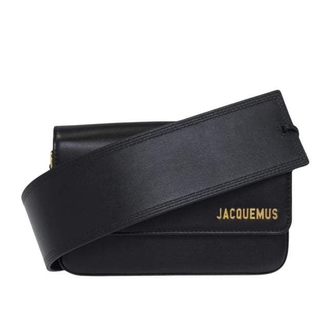 Jacquemus Le Carinu Black Bag is the epitome of contemporary luxury that every fashion-forward woman deserves. This sleek designer accessory combines minimalist French aesthetics with practical functionality. The sophisticated black finish ensures versatility with any outfit, from casual daywear to elegant evening ensembles. Crafted with meticulous attention to detail, this coveted piece instantly elevates your style credentials while offering the perfect size for your essentials. Don't miss the opportunity to own this season's must-have accessory. Dimensions: 12 x 18.5cm. 100% Leather Made In Spain