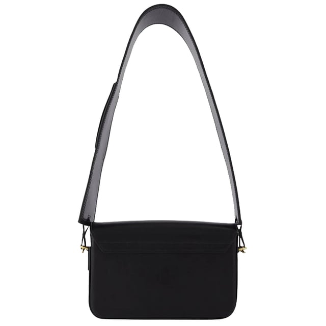 Jacquemus Le Carinu Black Bag is the epitome of contemporary luxury that every fashion-forward woman deserves. This sleek designer accessory combines minimalist French aesthetics with practical functionality. The sophisticated black finish ensures versatility with any outfit, from casual daywear to elegant evening ensembles. Crafted with meticulous attention to detail, this coveted piece instantly elevates your style credentials while offering the perfect size for your essentials. Don't miss the opportunity to own this season's must-have accessory. Dimensions: 12 x 18.5cm. 100% Leather Made In Spain