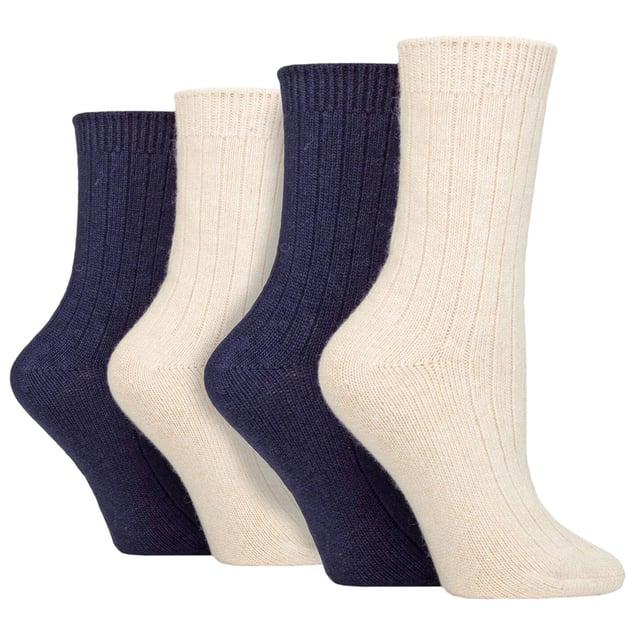 Wildfeet - Ladies 4 Pair Multi Pack Cashmere Bed Socks: These ladies’ Wildfeet Cashmere Socks are the socks of luxury and comfort. Made from a blend of natural wool, viscose, and cashmere, they are designed to provide warmth and cosiness throughout the day, whether you're running errands or relaxing at home. These socks offer the perfect balance of luxury and practicality with a blend of wool, viscose, and cashmere. The soft and comfortable material provides warmth and insulation to keep your feet cosy in the cold weather while also being breathable and moisture-wicking. The combination of fibres makes these socks more durable, ensuring long-lasting wear, while the ribbed leg enhances comfort. These 4 pairs of Wildfeet Cashmere Socks come in 2 gift boxes and attractively wrapped with a satin ribbon bow, which makes them ideal for gifting to friends or family. . Wild Feet is a range of socks featuring cool designs, bold colours and quirky catchphrases - from pugs and penguins, to lions and llamas!. There are 14 colours to choose from. They come in one size Ladies 4-8 UK, are made from 37% Wool, 27% Viscose, 24% Polyamide, 11% Cashmere, 1% Elastane and are machine washable. Extra Product Details: Ladies Wildfeet Bed Socks Wool & Cashmere Blend Fibres 14 Great Colour Options Made For Relaxing Ribbed Legs 4 Pairs Value Pack A Great Gift Idea The Ideal Stocking Filler Soft & Breathable