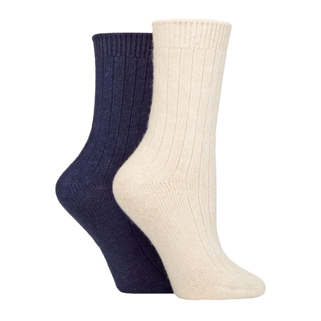 Wildfeet - Ladies 4 Pair Multi Pack Cashmere Bed Socks: These ladies’ Wildfeet Cashmere Socks are the socks of luxury and comfort. Made from a blend of natural wool, viscose, and cashmere, they are designed to provide warmth and cosiness throughout the day, whether you're running errands or relaxing at home. These socks offer the perfect balance of luxury and practicality with a blend of wool, viscose, and cashmere. The soft and comfortable material provides warmth and insulation to keep your feet cosy in the cold weather while also being breathable and moisture-wicking. The combination of fibres makes these socks more durable, ensuring long-lasting wear, while the ribbed leg enhances comfort. These 4 pairs of Wildfeet Cashmere Socks come in 2 gift boxes and attractively wrapped with a satin ribbon bow, which makes them ideal for gifting to friends or family. . Wild Feet is a range of socks featuring cool designs, bold colours and quirky catchphrases - from pugs and penguins, to lions and llamas!. There are 14 colours to choose from. They come in one size Ladies 4-8 UK, are made from 37% Wool, 27% Viscose, 24% Polyamide, 11% Cashmere, 1% Elastane and are machine washable. Extra Product Details: Ladies Wildfeet Bed Socks Wool & Cashmere Blend Fibres 14 Great Colour Options Made For Relaxing Ribbed Legs 4 Pairs Value Pack A Great Gift Idea The Ideal Stocking Filler Soft & Breathable