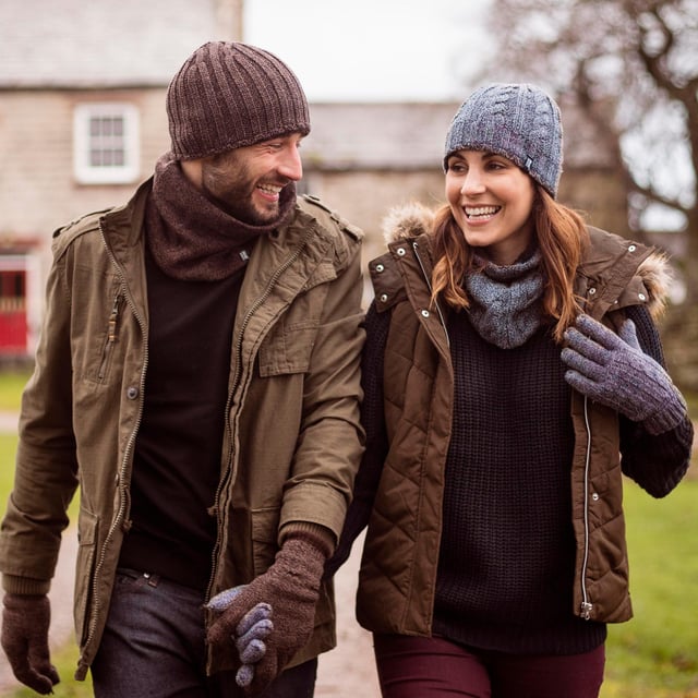 Heat Holders - Ladies Set - Hat / Gloves / Neckwarmer / Twist Socks: Wrap yourself in complete comfort with the Heat Holders Ladies Winter Set, including a thermal hat, gloves, neckwarmer, and cosy twist socks. Designed to keep you warm from head to toe, each piece in this set is crafted with Heat Holders’ advanced thermal technology, providing exceptional insulation for cold winter days. Whether you're heading out for a frosty walk or enjoying a relaxed day indoors, this set ensures warmth and style in every moment. The thermal hat and neckwarmer offer full head and neck coverage, ideal for blocking out icy winds. The gloves are lined with HeatWeaver thermal fabric, delivering a soft and snug feel while locking in heat. Completing the set, the twist socks are thick, plush, and perfect for keeping your feet warm during the chilliest weather. With various colour options and sizes (S/M and M/L), this set makes a practical yet thoughtful gift or a reliable winter essential for yourself. Extra Product Details: Includes: Thermal hat, gloves, neckwarmer, twist socks Thermal lining: HeatWeaver insulation Sizes: S/M, M/L Colours: Multiple options available Ideal for cold weather Great gift idea Soft, plush, and cosy feel throughout. Stay warm and stylish with this complete winter-ready accessory set.