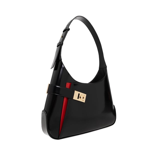 - Composición: 100% piel de becerro - Correa de hombro ajustable - Un compartimento interior - Cierre magnético - Largo 35 cm - Ancho 6 cm - Alto 23 cm - Un bolsillo frontal - Herrajes 'GanciniÔøΩÔøΩÔøΩ - Elementos metálicos en tono dorado - Hecho en Italia - Género: MUJER