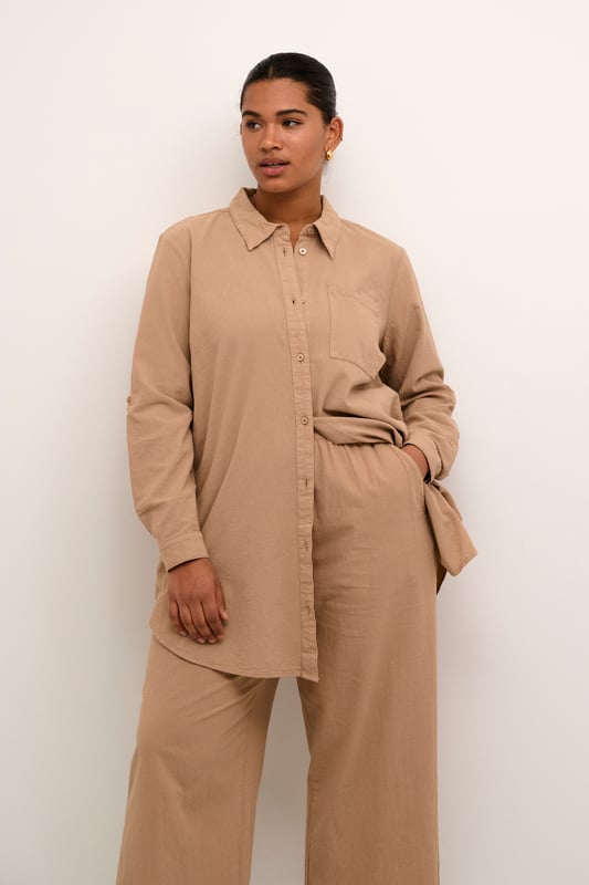 Loose fit,Taille lengte,Lange mouwen  Wassen op 30°, niet bleken, drogen in droger behoedzaam, Druipnat ophangen in de schaduw, warm strijken max. 150° C, Droogreiniging  100% Katoen