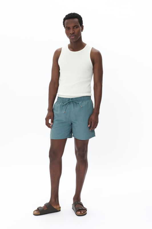 Regular fit,Regular taille met laag kruis  Fijne was 30°, niet bleken, drogen in droger behoedzaam, Druipnat ophangen, koud strijken max. 110° C, Droogreiniging  100% Polyamide