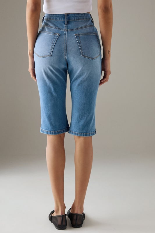 Classic knee-length denim capri with a clean, streamlined silhouette
        High-rise waistband for a flattering fit and comfortable coverage
        Traditional five-pocket styling with visible contrast stitching
        Straight-cut leg design with a neat, finished hem
        Crafted from 100% cotton for breathable comfort and durability
    
    These versatile denim capris from Warehouse strike the perfect balance between casual comfort and refined style. The high-rise design creates a sleek silhouette that pairs beautifully with both fitted and oversized tops. Style them with a crisp white crop top and an oversized leather jacket for an effortlessly cool daytime look, or dress them up with a silky blouse and pointed heels for evening drinks. The straight-cut leg offers a timeless appeal that works wonderfully for family gatherings or weekend brunches. These capris transition seamlessly between seasons - wear them with trainers and a light jumper for cooler days or with sandals and a floaty top when temperatures rise. Their durable cotton construction ensures they'll remain a wardrobe staple for years to come.