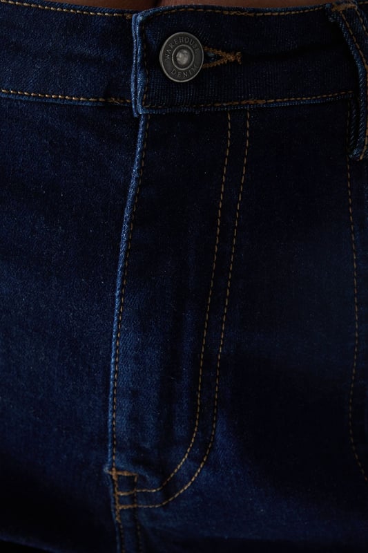 Classic knee-length denim capri with a clean, streamlined silhouette
        High-rise waistband for a flattering fit and comfortable coverage
        Traditional five-pocket styling with visible contrast stitching
        Straight-cut leg design with a neat, finished hem
        Crafted from 100% cotton for breathable comfort and durability
    
    These versatile denim capris from Warehouse strike the perfect balance between casual comfort and refined style. The high-rise design creates a sleek silhouette that pairs beautifully with both fitted and oversized tops. Style them with a crisp white crop top and an oversized leather jacket for an effortlessly cool daytime look, or dress them up with a silky blouse and pointed heels for evening drinks. The straight-cut leg offers a timeless appeal that works wonderfully for family gatherings or weekend brunches. These capris transition seamlessly between seasons - wear them with trainers and a light jumper for cooler days or with sandals and a floaty top when temperatures rise. Their durable cotton construction ensures they'll remain a wardrobe staple for years to come.