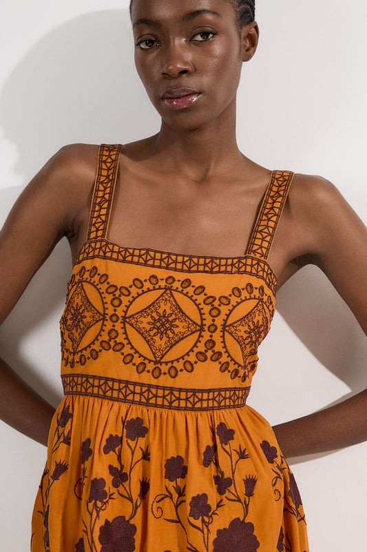 Get summer ready in our midaxi dress, with embroidered floral detailing, a straight neckline that accentuates the bust, a fit and flare silhouette which flatters every silhouette, and a cut out feature in the back. Pair it with strappy sandals for an elevated daytime look, perfect for summer days and holidays. Floral & Geo Embroidered Woven Midaxi High Quality Embroidered Detailing Universally Flattering Fit and Flare Silhouette Straight Neckline Statement Cut Out in Back Dramatic, Long Length Button Fastening in BackDiscover this seasons floral dresses or browse the full collection of women's dresses now.