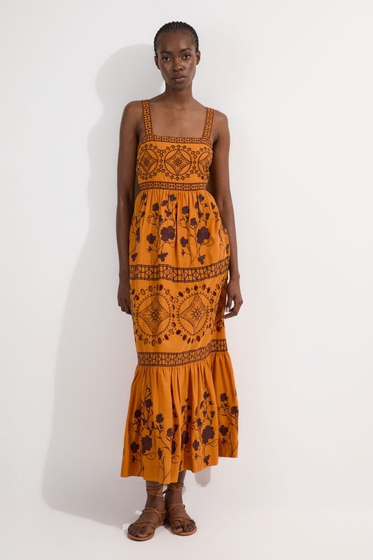 Get summer ready in our midaxi dress, with embroidered floral detailing, a straight neckline that accentuates the bust, a fit and flare silhouette which flatters every silhouette, and a cut out feature in the back. Pair it with strappy sandals for an elevated daytime look, perfect for summer days and holidays. Floral & Geo Embroidered Woven Midaxi High Quality Embroidered Detailing Universally Flattering Fit and Flare Silhouette Straight Neckline Statement Cut Out in Back Dramatic, Long Length Button Fastening in BackDiscover this seasons floral dresses or browse the full collection of women's dresses now.