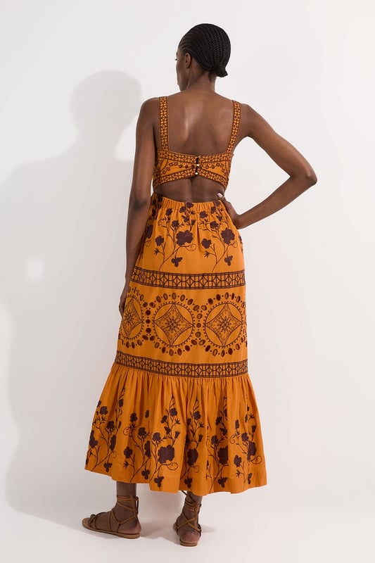 Get summer ready in our midaxi dress, with embroidered floral detailing, a straight neckline that accentuates the bust, a fit and flare silhouette which flatters every silhouette, and a cut out feature in the back. Pair it with strappy sandals for an elevated daytime look, perfect for summer days and holidays. Floral & Geo Embroidered Woven Midaxi High Quality Embroidered Detailing Universally Flattering Fit and Flare Silhouette Straight Neckline Statement Cut Out in Back Dramatic, Long Length Button Fastening in BackDiscover this seasons floral dresses or browse the full collection of women's dresses now.