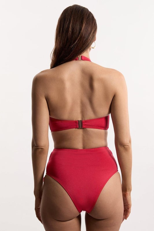 Get holiday ready in our bikini bottoms, with stitched detailing at the sides, and a full coverage design. Pairs perfectly with the matching top, sandals, and sunglasses for a holiday look perfect for lounging in the sun. Slinky Tie Detail Cheeky Bikini Bottoms Stitch Detailing at Hips Comfortable, Full Coverage Design Comfortable, High Waistline Matching Top Sold Separately Whilst appropriate for a beach destination, please note that in order to ensure enduring quality, this piece is not recommended for swimming.