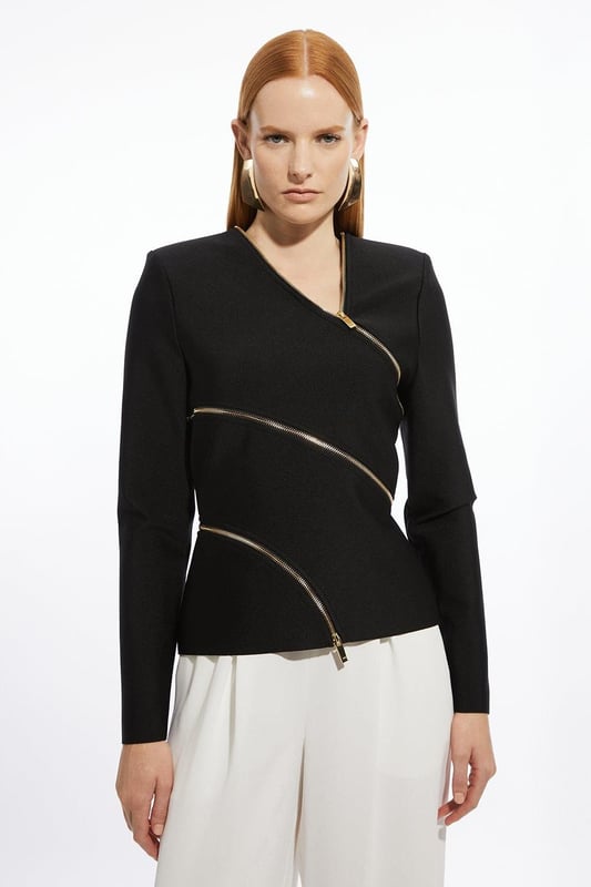 Elevate your top selection with our long sleeve top, with a figure hugging fit, and zip detailing that wraps around the body. This piece pairs well with anything, from matching separates, to tailored trousers, to jeans for an elevated look that will take you seamlessly from day to night. Asymmetric Zip Detail Figure Form Bandage Knit Top High Quality Knit Fabric Unique Zip Design Asymmetric V Neckline Fitted Silhouette Structured Shoulders Zip Back Fastening
