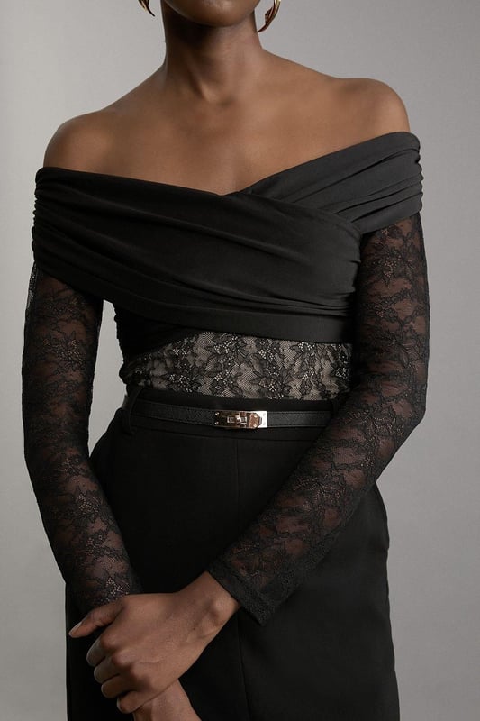 Elevate your occasion wear wardrobe with our bodysuit, with a figure hugging lace bodice and a ruched jersey overlay. The sweetheart, bardot neckline and keyhole back make for an elevated, statement occasion piece that is certain to turn heads. Style it with tailored trousers and strappy heels for an occasion look that is guaranteed to turn heads wherever you step. Lace And Jersey Crepe Bardot Bodysuit Statement Lace Bodice High Quality, Soft Jersey Overlay Figure Hugging Fit Off Shoulder, Bardot Neckline Ruched, Crossed Design Keyhole Back Accent