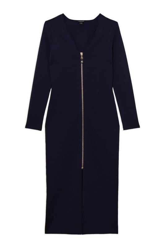 Zip Up Full Needle Knitted Dress Elevate your cold weather wardrobe in our long sleeve dress, with a fitted silhouette, metallic zip detailing, and a unique V neckline. Style it with heeled boots or chunky loafers for an elevated day to night look. Zip Up Full Needle Knitted Dress High Quality Soft Knit Fabric Flattering Figure Hugging Silhouette Rounded V Neckline Zip Front Fastening Thigh High Leg Split