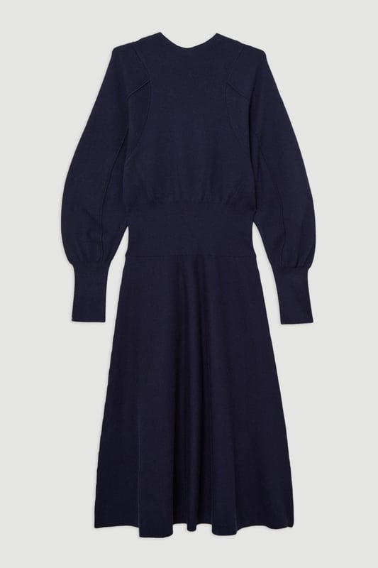 Introducing By Lydia: An Elegant Invitation - a new season collection with Lydia Millen, infused with sophistication and flair for the party season. Go seamlessly from day to night in our midi dress, made in soft knit fabric, featuring long sleeves, and a comfortable, relaxed fit that cinches at the waist to flaunt the figure. Style it simply with heeled boots or pointed toe heels for a look that will take you from date nights to upcoming parties and events. Lydia Millen Wool Look Rounded Sleeve Knit Midaxi Dress Seamless Knit Fabric Flattering Relaxed Silhouette Cinched Waistline Straight Hanging Skirt High Neckline