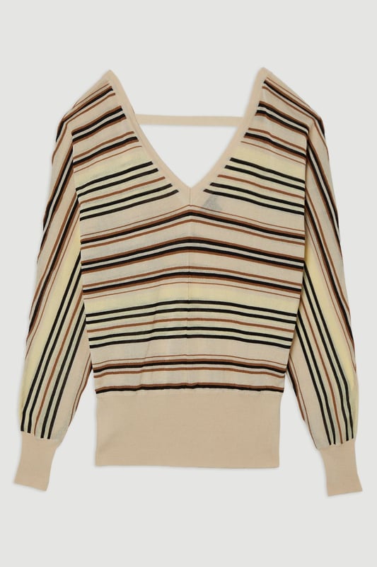 Lightweight knitted jumper with delicate stitch detailing Elegant V-neckline for a flattering silhouette Relaxed fit with dropped shoulders for effortless style Versatile design suitable for various daywear occasions Subtle texture adds visual interest to the garment  This Karen Millen lightweight knitted jumper is the epitome of casual sophistication. The delicate stitch detailing adds a touch of refinement to this everyday essential, while the V-neckline creates a flattering frame for your dcolletage. Perfect for those laid-back days when you want to look put-together without trying too hard. Style it with wide-leg trousers and a slim belt for a chic daytime ensemble, or pair it with your favourite jeans for a relaxed weekend look. The versatility of this jumper makes it ideal for family gatherings, brunch dates, or casual outings. Its lightweight nature allows for easy layering, making it a go-to piece for transitional weather. Remember to accessorise with minimalist jewellery to complement the jumper's understated elegance.