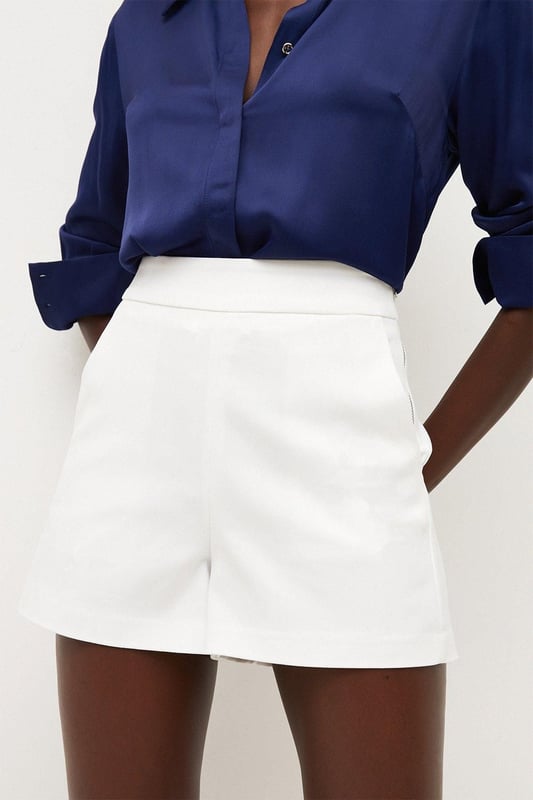 Channel effortless summer style with the High Summer 2024 collection, that will have all eventualities covered from sunrise to sunset. Elevate your summer wardrobe in our shorts, with a wide leg silhouette, a minimal design, and pocket features. Style it with anything, from a button up shirt for an elevated look that will take you seamlessly from day to night, to a T-shirt for a more relaxed approach. Essential Techno Woven Shorts Comfortable, Wide Leg Fit Comfortable High Waistline Pocket Features Sleek, Minimal Design