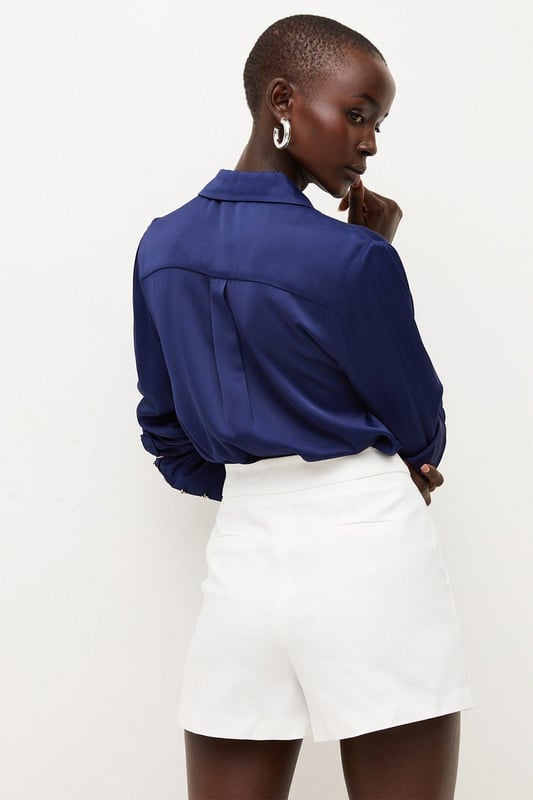 Channel effortless summer style with the High Summer 2024 collection, that will have all eventualities covered from sunrise to sunset. Elevate your summer wardrobe in our shorts, with a wide leg silhouette, a minimal design, and pocket features. Style it with anything, from a button up shirt for an elevated look that will take you seamlessly from day to night, to a T-shirt for a more relaxed approach. Essential Techno Woven Shorts Comfortable, Wide Leg Fit Comfortable High Waistline Pocket Features Sleek, Minimal Design