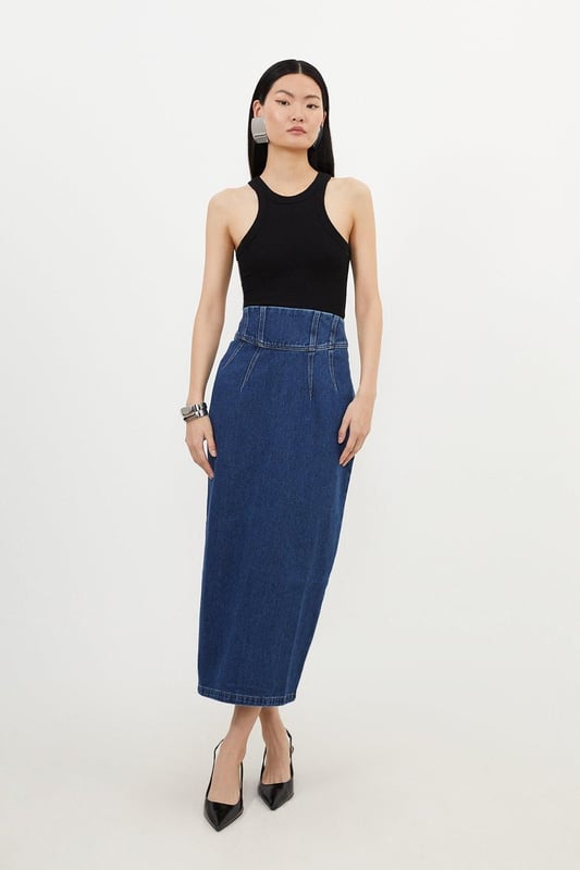 Sculpting the silhouette with a pencil fit, this contemporary maxi skirt is crafted from premium denim. Featuring a corset waist and stitch detail, invest in this skirt for a capsule wardrobe piece.DenimMaxi skirtCorset waistBrowse this seasons denim skirts or discover the full range of skirts now.Matching piece sold separately.