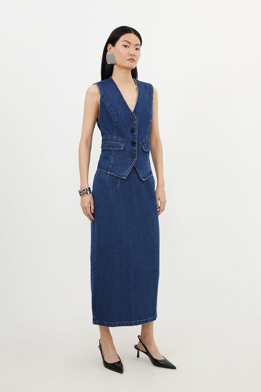Sculpting the silhouette with a pencil fit, this contemporary maxi skirt is crafted from premium denim. Featuring a corset waist and stitch detail, invest in this skirt for a capsule wardrobe piece.DenimMaxi skirtCorset waistBrowse this seasons denim skirts or discover the full range of skirts now.Matching piece sold separately.