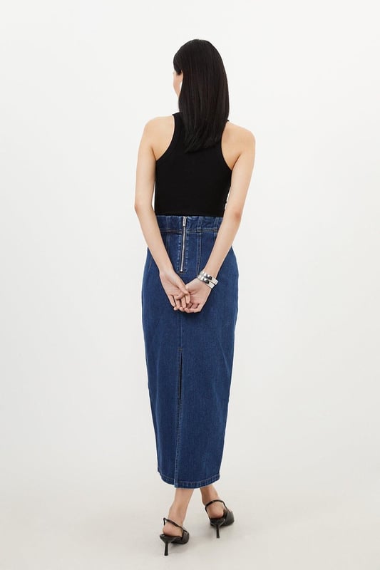 Sculpting the silhouette with a pencil fit, this contemporary maxi skirt is crafted from premium denim. Featuring a corset waist and stitch detail, invest in this skirt for a capsule wardrobe piece.DenimMaxi skirtCorset waistBrowse this seasons denim skirts or discover the full range of skirts now.Matching piece sold separately.