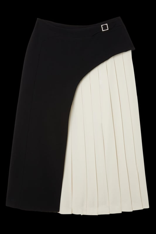 Feel elegant in our midi skirt, with a universally flattering silhouette, pleated detailing, and a high waistline, perfect for getting a little dressed up. Style this piece with strappy heels for an outfit that will turn heads from office days to upcoming occasions and events. Tailored Buckle Detail Pleated Midi Skirt Formal, Flowing Fit High Waistline Unique Pleated Panel Midi Length Metallic Buckle at WaistlineBrowse this seasons work skirts or discover the full range of workwear now.