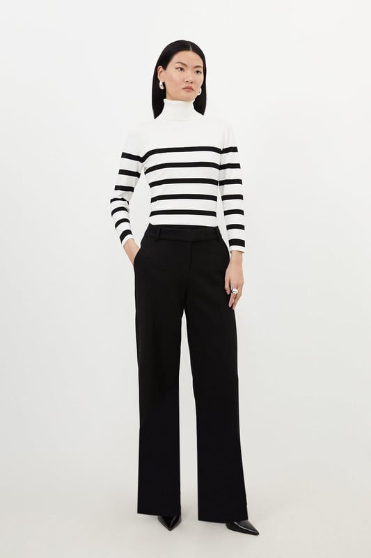 A capsule wardrobe piece that can be styled multiple ways, these trousers are cut in a modern straight leg design that hangs to the ankles with classic belt loops for practicality. Pair this piece with a matching blazer for a sleek workwear ensemble that can go from desk to dinner.Straight legBelt loopsTailored Browse this seasons suits now.