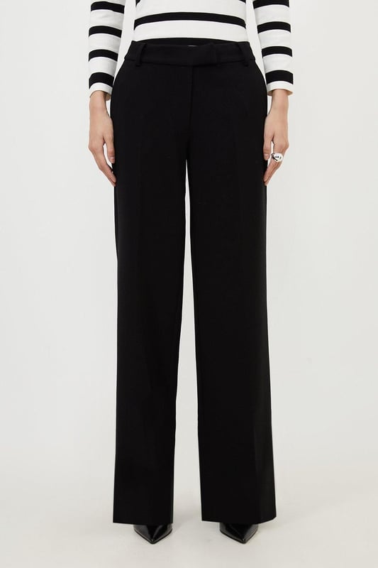 A capsule wardrobe piece that can be styled multiple ways, these trousers are cut in a modern straight leg design that hangs to the ankles with classic belt loops for practicality. Pair this piece with a matching blazer for a sleek workwear ensemble that can go from desk to dinner.Straight legBelt loopsTailored Browse this seasons suits now.