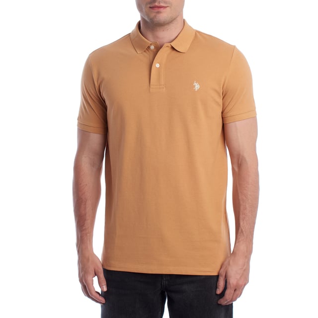 Inspired by the brand's sporting heritage, this US Polo Assn. polo offers a perfect blend of tradition and modernity. Designed for the man who values authenticity, its impeccable cut and embroidered details make it a contemporary wardrobe staple.

 Details:
 - Classic polo-style collar with two-button placket.
 - Short sleeves.
 - Piping detail on the inside of the neck.
 - US Polo Assn. logo embroidered on the chest.
 - Regular cut that guarantees comfort and freedom of movement.
 - High quality breathable piqué fabric.

 At US Polo Assn., every garment tells a story of authenticity, tradition, and sporty style. This men's polo shirt isn't just a staple: it represents the official heritage of the sport of polo and reflects our passion for quality, design, and casual elegance. Dress with identity, dress with history.
 Composition: 100% Cotton
 Care:
Machine wash cold (max. 30°C).
 Do not use bleach.
 Iron at low temperature if necessary.
 Air dry, avoid dryer.