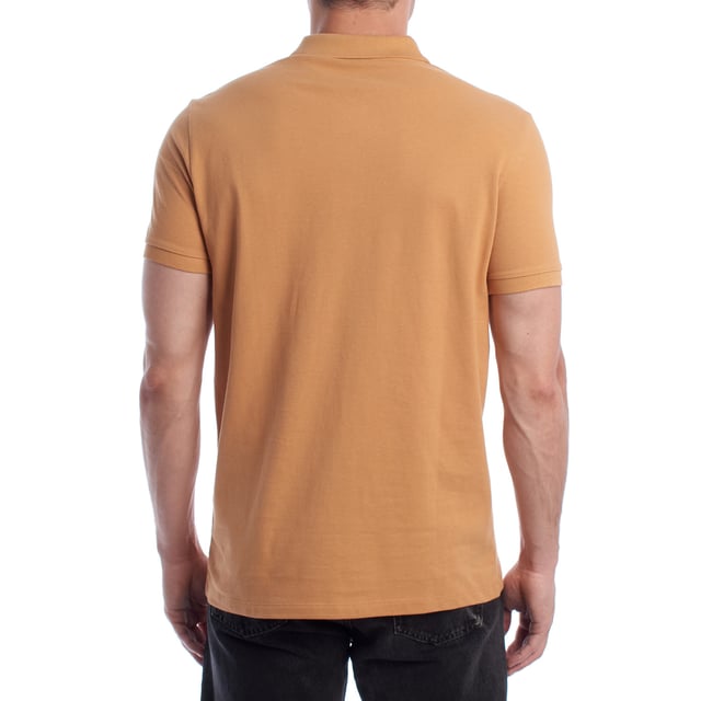 Inspired by the brand's sporting heritage, this US Polo Assn. polo offers a perfect blend of tradition and modernity. Designed for the man who values authenticity, its impeccable cut and embroidered details make it a contemporary wardrobe staple.

 Details:
 - Classic polo-style collar with two-button placket.
 - Short sleeves.
 - Piping detail on the inside of the neck.
 - US Polo Assn. logo embroidered on the chest.
 - Regular cut that guarantees comfort and freedom of movement.
 - High quality breathable piqué fabric.

 At US Polo Assn., every garment tells a story of authenticity, tradition, and sporty style. This men's polo shirt isn't just a staple: it represents the official heritage of the sport of polo and reflects our passion for quality, design, and casual elegance. Dress with identity, dress with history.
 Composition: 100% Cotton
 Care:
Machine wash cold (max. 30°C).
 Do not use bleach.
 Iron at low temperature if necessary.
 Air dry, avoid dryer.