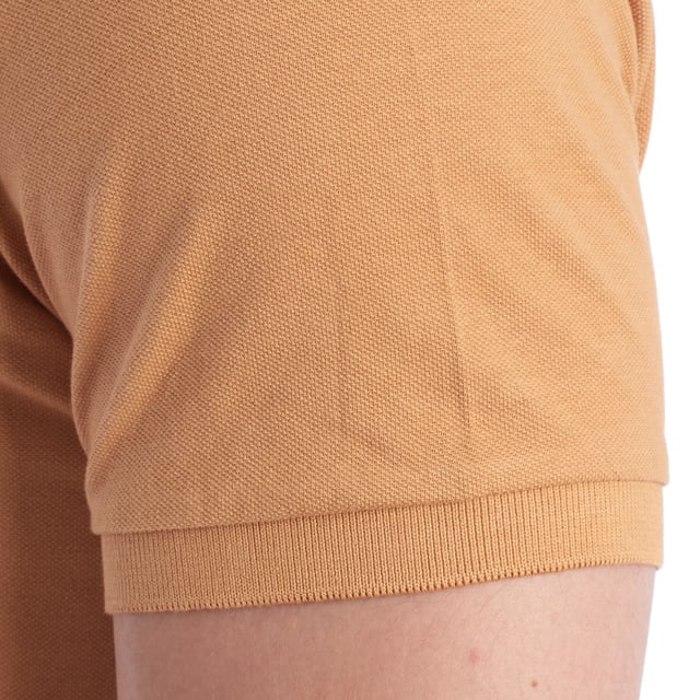 Inspired by the brand's sporting heritage, this US Polo Assn. polo offers a perfect blend of tradition and modernity. Designed for the man who values authenticity, its impeccable cut and embroidered details make it a contemporary wardrobe staple.

 Details:
 - Classic polo-style collar with two-button placket.
 - Short sleeves.
 - Piping detail on the inside of the neck.
 - US Polo Assn. logo embroidered on the chest.
 - Regular cut that guarantees comfort and freedom of movement.
 - High quality breathable piqué fabric.

 At US Polo Assn., every garment tells a story of authenticity, tradition, and sporty style. This men's polo shirt isn't just a staple: it represents the official heritage of the sport of polo and reflects our passion for quality, design, and casual elegance. Dress with identity, dress with history.
 Composition: 100% Cotton
 Care:
Machine wash cold (max. 30°C).
 Do not use bleach.
 Iron at low temperature if necessary.
 Air dry, avoid dryer.
