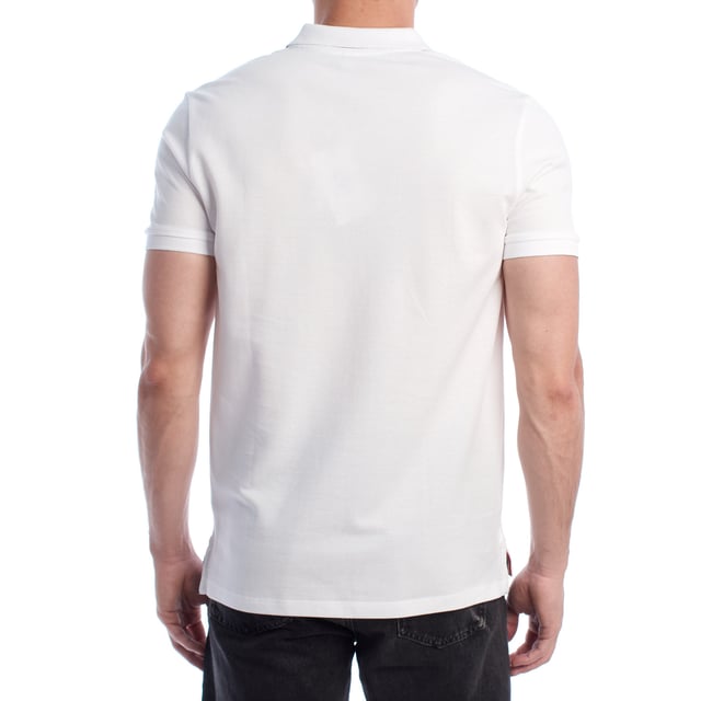 Inspired by the brand's sporting heritage, this US Polo Assn. polo offers a perfect blend of tradition and modernity. Designed for the man who values authenticity, its impeccable cut and embroidered details make it a contemporary wardrobe staple.

 Details:
 - Classic polo-style collar with two-button placket.
 - Short sleeves.
 - Tricolor trim detail on the inside of the neck.
 - US Polo Assn. logo embroidered on the chest with “Since 1890” inscription.
 - Regular cut that guarantees comfort and freedom of movement.
 - High quality breathable piqué fabric.

 At US Polo Assn., every garment tells a story of authenticity, tradition, and sporty style. This men's polo shirt isn't just a staple: it represents the official heritage of the sport of polo and reflects our passion for quality, design, and casual elegance. Dress with identity, dress with history.
 Composition: 100% Cotton
 Care:
Machine wash cold (max. 30°C).
 Do not use bleach.
 Iron at low temperature if necessary.
 Air dry, avoid dryer.