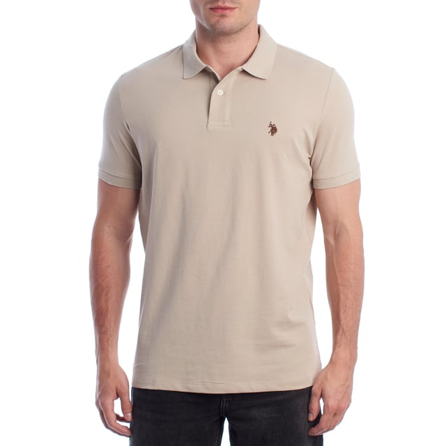 Inspired by the brand's sporting heritage, this US Polo Assn. polo offers a perfect blend of tradition and modernity. Designed for the man who values authenticity, its impeccable cut and embroidered details make it a contemporary wardrobe staple.

 Details:
 - Classic polo-style collar with two-button placket.
 - Short sleeves.
 - Piping detail on the inside of the neck.
 - US Polo Assn. logo embroidered on the chest.
 - Regular cut that guarantees comfort and freedom of movement.
 - High quality breathable piqué fabric.

 At US Polo Assn., every garment tells a story of authenticity, tradition, and sporty style. This men's polo shirt isn't just a staple: it represents the official heritage of the sport of polo and reflects our passion for quality, design, and casual elegance. Dress with identity, dress with history.
 Composition: 100% Cotton
 Care:
Machine wash cold (max. 30°C).
 Do not use bleach.
 Iron at low temperature if necessary.
 Air dry, avoid dryer.