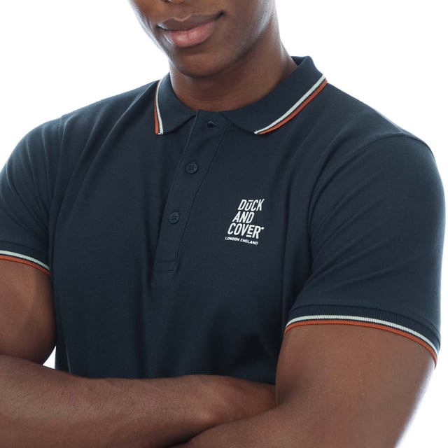 Mens Duck and Cover 3 Pack of Melports Polo Shirts in multi colour.- Turn down collar.- Short sleeves with ribbed cuffs.- Three button placket.- Contrast stripe details.- 3- pack.- 100% Cotton.- Ref: DC2M123565ML