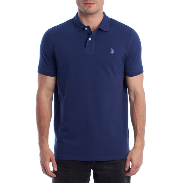 Inspired by the brand's sporting heritage, this US Polo Assn. polo offers a perfect blend of tradition and modernity. Designed for the man who values authenticity, its impeccable cut and embroidered details make it a contemporary wardrobe staple.

 Details:
 - Classic polo-style collar with two-button placket.
 - Short sleeves.
 - Piping detail on the inside of the neck.
 - US Polo Assn. logo embroidered on the chest.
 - Regular cut that guarantees comfort and freedom of movement.
 - High quality breathable piqué fabric.

 At US Polo Assn., every garment tells a story of authenticity, tradition, and sporty style. This men's polo shirt isn't just a staple: it represents the official heritage of the sport of polo and reflects our passion for quality, design, and casual elegance. Dress with identity, dress with history.
 Composition: 100% Cotton
 Care:
Machine wash cold (max. 30°C).
 Do not use bleach.
 Iron at low temperature if necessary.
 Air dry, avoid dryer.