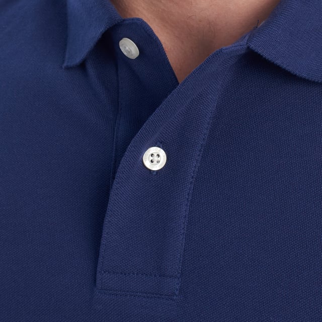 Inspired by the brand's sporting heritage, this US Polo Assn. polo offers a perfect blend of tradition and modernity. Designed for the man who values authenticity, its impeccable cut and embroidered details make it a contemporary wardrobe staple.

 Details:
 - Classic polo-style collar with two-button placket.
 - Short sleeves.
 - Piping detail on the inside of the neck.
 - US Polo Assn. logo embroidered on the chest.
 - Regular cut that guarantees comfort and freedom of movement.
 - High quality breathable piqué fabric.

 At US Polo Assn., every garment tells a story of authenticity, tradition, and sporty style. This men's polo shirt isn't just a staple: it represents the official heritage of the sport of polo and reflects our passion for quality, design, and casual elegance. Dress with identity, dress with history.
 Composition: 100% Cotton
 Care:
Machine wash cold (max. 30°C).
 Do not use bleach.
 Iron at low temperature if necessary.
 Air dry, avoid dryer.