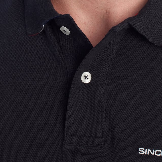 Inspired by the brand's sporting heritage, this US Polo Assn. polo offers a perfect blend of tradition and modernity. Designed for the man who values authenticity, its impeccable cut and embroidered details make it a contemporary wardrobe staple.

 Details:
 - Classic polo-style collar with two-button placket.
 - Short sleeves.
 - Tricolor trim detail on the inside of the neck.
 - US Polo Assn. logo embroidered on the chest with “Since 1890” inscription.
 - Regular cut that guarantees comfort and freedom of movement.
 - High quality breathable piqué fabric.

 At US Polo Assn., every garment tells a story of authenticity, tradition, and sporty style. This men's polo shirt isn't just a staple: it represents the official heritage of the sport of polo and reflects our passion for quality, design, and casual elegance. Dress with identity, dress with history.
 Composition: 100% Cotton
 Care:
Machine wash cold (max. 30°C).
 Do not use bleach.
 Iron at low temperature if necessary.
 Air dry, avoid dryer.