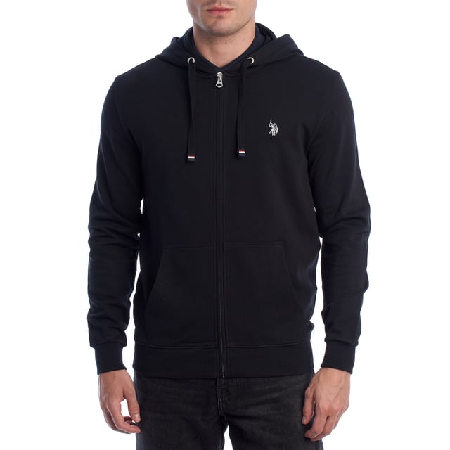 Designed for those who value functionality without sacrificing style, this US Polo Assn. zip-up hoodie combines comfort, contemporary design, and sporting heritage. Ideal for casual looks or light workouts, it adapts to the pace of everyday life with a timeless aesthetic.

 Details:
 - Full zip front closure.
 - Hood with adjustable contrasting drawstring.
 - Round neck.
 - Functional kangaroo pockets.
 - US Polo Assn. logo embroidered on the chest.
 - Soft and stretchy fabric, ideal for everyday use.
 - Ribbed cuffs and waistband.
 - Matching visible seams.

 At US Polo Assn., every garment reflects the authentic spirit of the sport of polo. This men's sweatshirt represents our commitment to quality, comfort, and classic style reinvented for the modern man.
 Composition: 100% Cotton
 Care:
Wash at maximum temperature 30º.
 Iron at low temperature.
 Do not use bleach.
 Do not use a dryer.
 Do not dry clean.