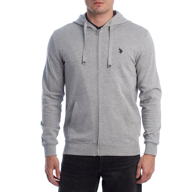 Designed for those who value functionality without sacrificing style, this US Polo Assn. zip-up hoodie combines comfort, contemporary design, and sporting heritage. Ideal for casual looks or light workouts, it adapts to the pace of everyday life with a timeless aesthetic.

 Details:
 - Full zip front closure.
 - Hood with adjustable contrasting drawstring.
 - Round neck.
 - Functional kangaroo pockets.
 - US Polo Assn. logo embroidered on the chest.
 - Soft and stretchy fabric, ideal for everyday use.
 - Ribbed cuffs and waistband.
 - Matching visible seams.

 At US Polo Assn., every garment reflects the authentic spirit of the sport of polo. This men's sweatshirt represents our commitment to quality, comfort, and classic style reinvented for the modern man.
 Composition: 100% Cotton
 Care:
Wash at maximum temperature 30º.
 Iron at low temperature.
 Do not use bleach.
 Do not use a dryer.
 Do not dry clean.