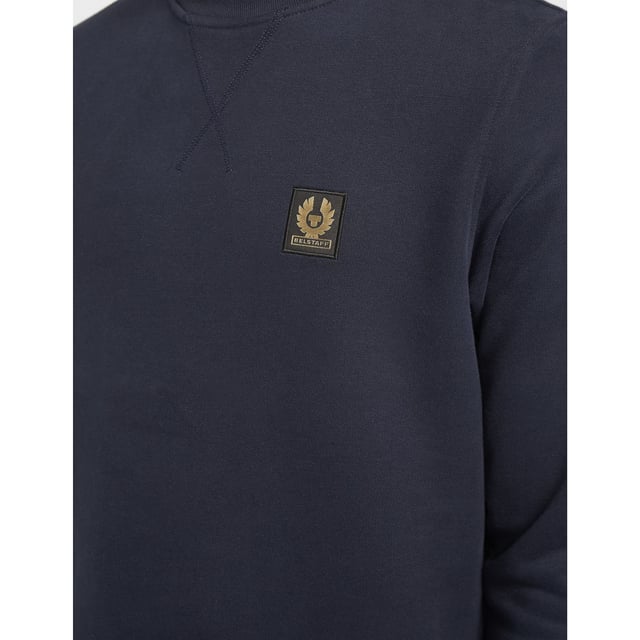 Tracing its roots back to 1909  seminal British label Belstaff infuse their pieces with their true spirit of adventure. They present this men's Patch Logo Sweatshirt which comes in a navy colourway and features an embroidered branding patch to the chest for a stylish staple sweatshirt. Details; navy colourway  ribbed crew neck  cuffs and hem  tonal stitching  regular fit and branding to the chest to complete.