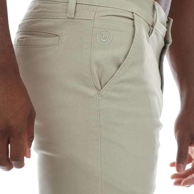Mens Duck and Cover Moretor Chino Pants in stone.- Zip fly and button fastening.- Front slant pockets and inner coin pocket with tonal rubber print logo.- Rear welt pockets- Slim fit.- 98% Cotton  2% Elastane.  Machine washable.  - Ref: DC2B121588STN