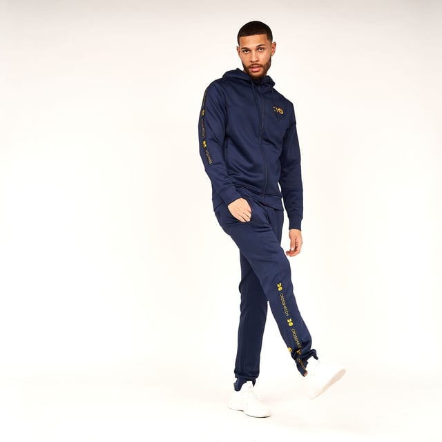 Mens Crosshatch Trackside Tracksuit in navy blueTrack top:- Drawcord-adjustable lined hood- Full zip fastening- Embroidered logo at left chest- Branded tape at sleeves- Side pocketsTrack pants:- Elasticated waist with drawcord- Side pockets- Rear pocket- Embroidered logo at left thigh- Branded tape at lower legs- 95% Polyester  5% Elastane.  Machine washable.- Ref: CH2Z119856AABLPlease note this style is sold as a set.  Returns will only be accepted if both items are returned together.
