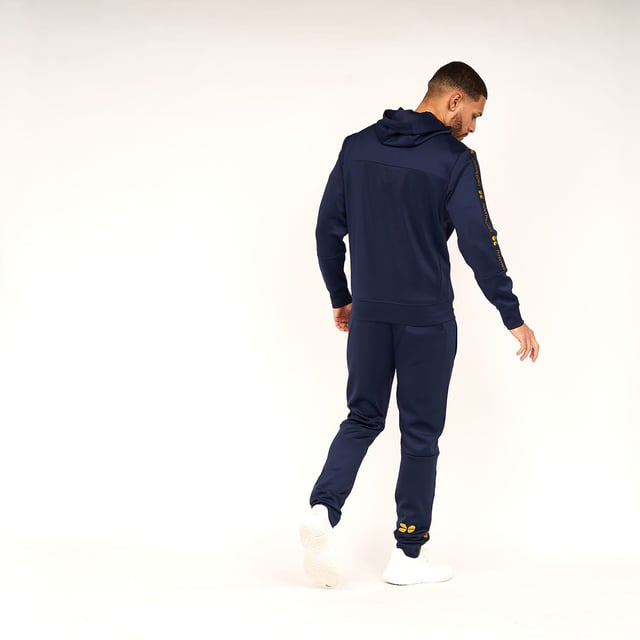 Mens Crosshatch Trackside Tracksuit in navy blueTrack top:- Drawcord-adjustable lined hood- Full zip fastening- Embroidered logo at left chest- Branded tape at sleeves- Side pocketsTrack pants:- Elasticated waist with drawcord- Side pockets- Rear pocket- Embroidered logo at left thigh- Branded tape at lower legs- 95% Polyester  5% Elastane.  Machine washable.- Ref: CH2Z119856AABLPlease note this style is sold as a set.  Returns will only be accepted if both items are returned together.