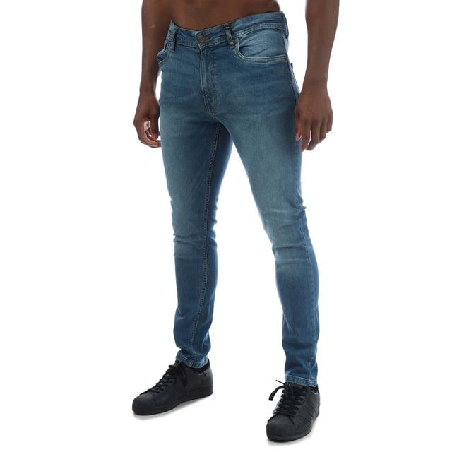 Mens Duck and Cover Doves Slim Fit Jeans in mid wash blue denim. - Classic 5-pocket construction. - Zip fly and button fastening. - Branded back waist patch.- Slim fit. - Short inside leg length approx. 30in  Regular inside leg length approx. 32in  Long inside length approx. 34in.- 98% Cotton  2% Elastane. Machine washable. - Ref: DC2B122666MWMeasurements are intended for guidance only.