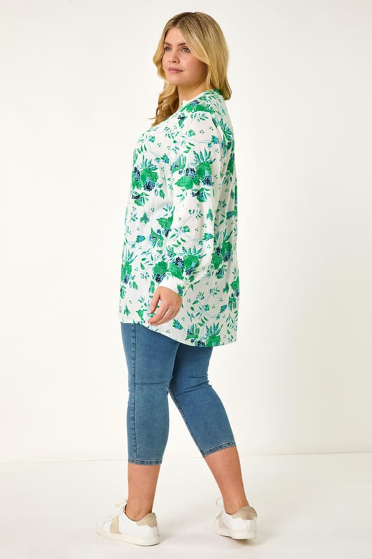 Curve Floral Print Pintuck Blouse from Roman. Add a touch of floral charm to your Spring Summer wardrobe with this gorgeous Curve pintuck blouse. The smart v-neckline and intricate pintuck detail create an elegant look. Crafted from a comfortable crinkle woven fabric in a beautiful floral print, this blouse features long sleeves and front buttons. Perfect for everyday wear, style with a denim jacket and jeggings for a completely stylish outfit!