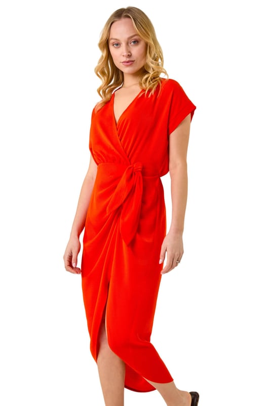 Dusk Tie Detail Wrap Dress from Roman. Flatter your figure this season with our stylish Dusk wrap dress! Cut from a floaty woven fabric, this Summer dress embodies warm weather glamour with a flattering v-neckline, wrap bodice and playful short sleeves. Plain in colour for endless outfit opportunities with striking side splits, this glamorous day dress is sure to elevate your casual collection. Wear with wedges and you’re picnic-ready!