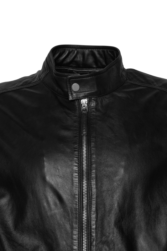 A timeless classic that only gets better with age. Crafted from premium real leather, this Barneys Originals biker jacket is a true wardrobe essential. Featuring a clean collar tab detail, sharp silver hardware, and a sleek silhouette, this jacket brings effortless edge to any outfit.

The buttery-soft leather molds to your shape over time, making it uniquely yours with every wear. Designed to outlast trends and seasons, this is an investment piece you'll reach for year after year.

Key Features:
– 100% real leather
– Classic biker cut with collar tab
– High-shine silver hardware
