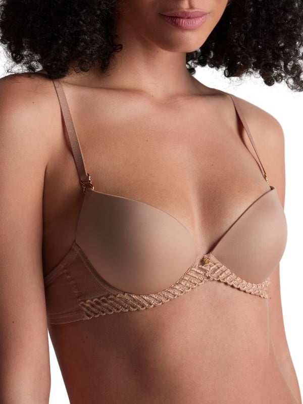 Aubade Sheer Emotion Moulded Push-Up Bra. Underwired plunge bra bra with lightweight moulded cleavage enhancing cups, shimmering fabric, a comfortable semi sheer mesh back, and intricate embroidery. Matching briefs available. This item is recommended for hand wash only.